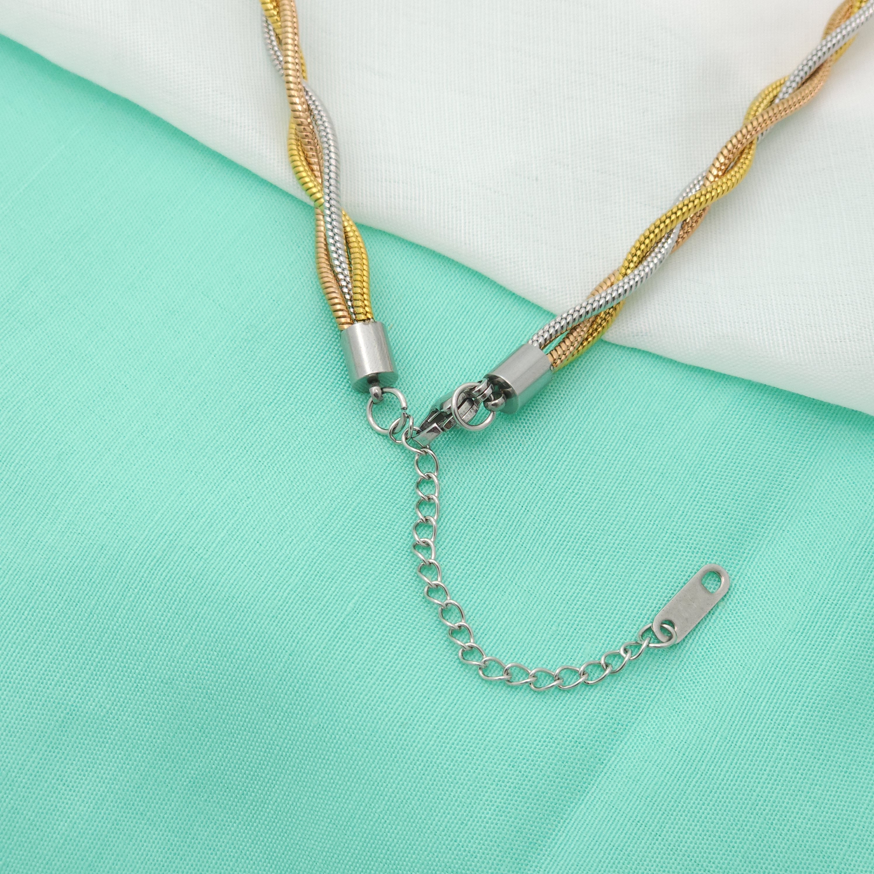 Trio Tangle – Three-Tone Twisted Elegance Chain